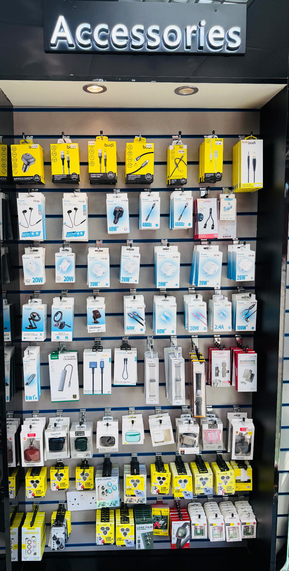 Phone accessories wall — cases, chargers and cables at Elect Tronex Wembley